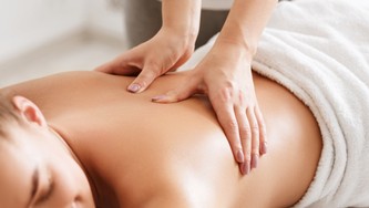 body-care-young-girl-having-massage-relaxing-in-5SRPTKV.jpg